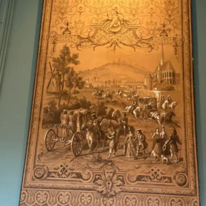 Large rectangular carved panel depicting a detailed historical gathering with figures, horses, trees, and decorative borders.