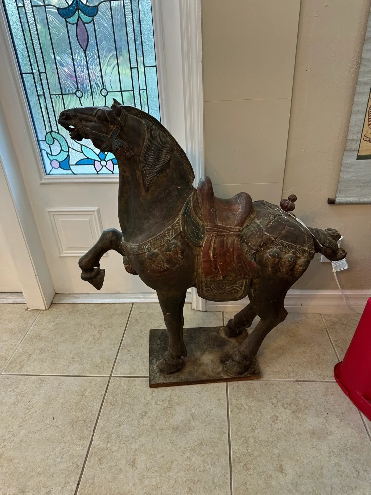 Large decorative sculpture of a rearing horse with a dark antiqued finish, mounted on a rectangular base.