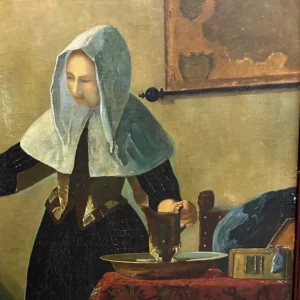 Period-style portrait of a bonneted woman seated beside a writing desk in a softly rendered interior.